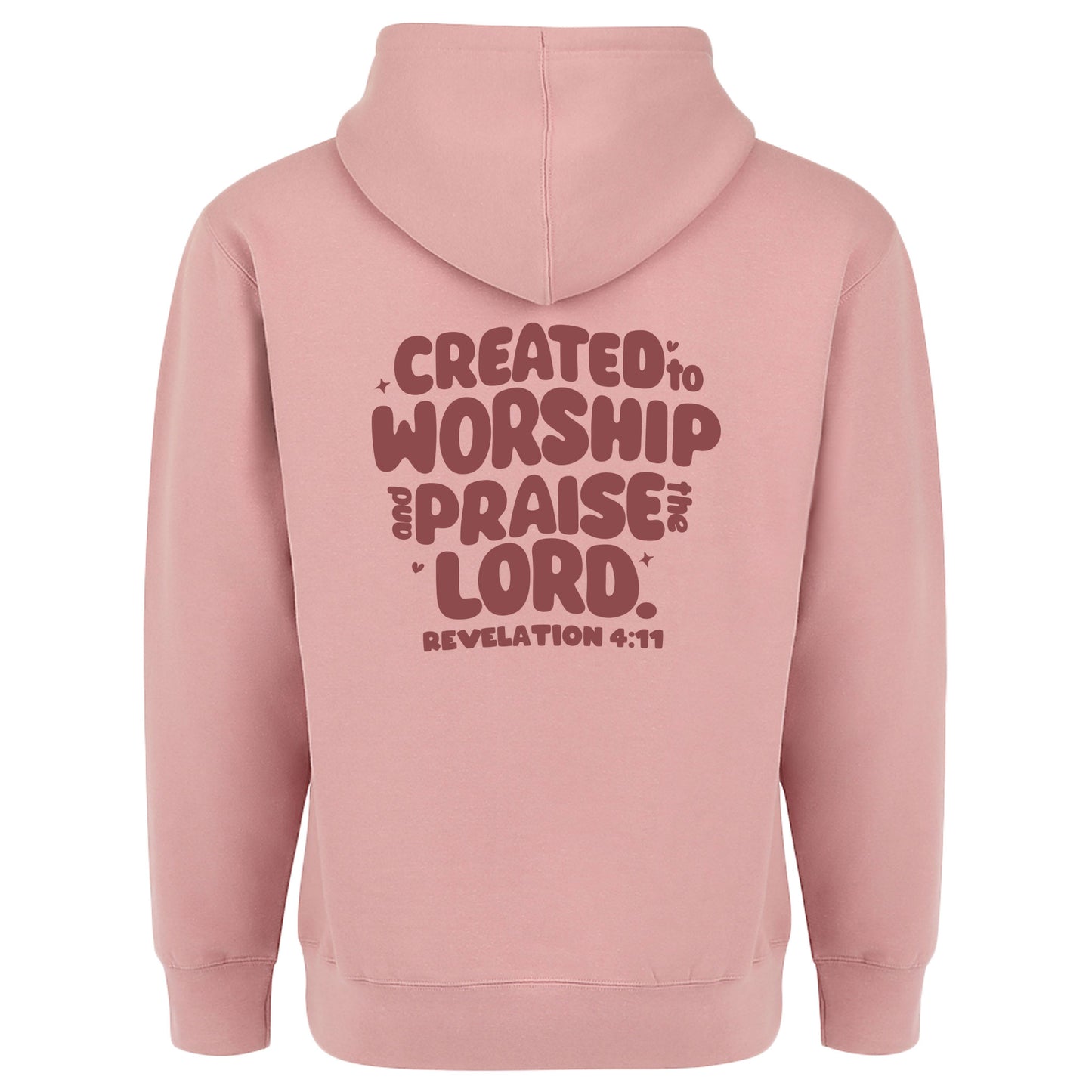 A pink hoodie with 'CREATED TO WORSHIP & PRAISE LORD' text and biblically inspired artwork in a fun, bubbly font surrounded by stars and hearts.