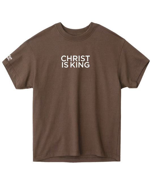 Brown t-shirt with 'CHRIST IS KING' text on a white background